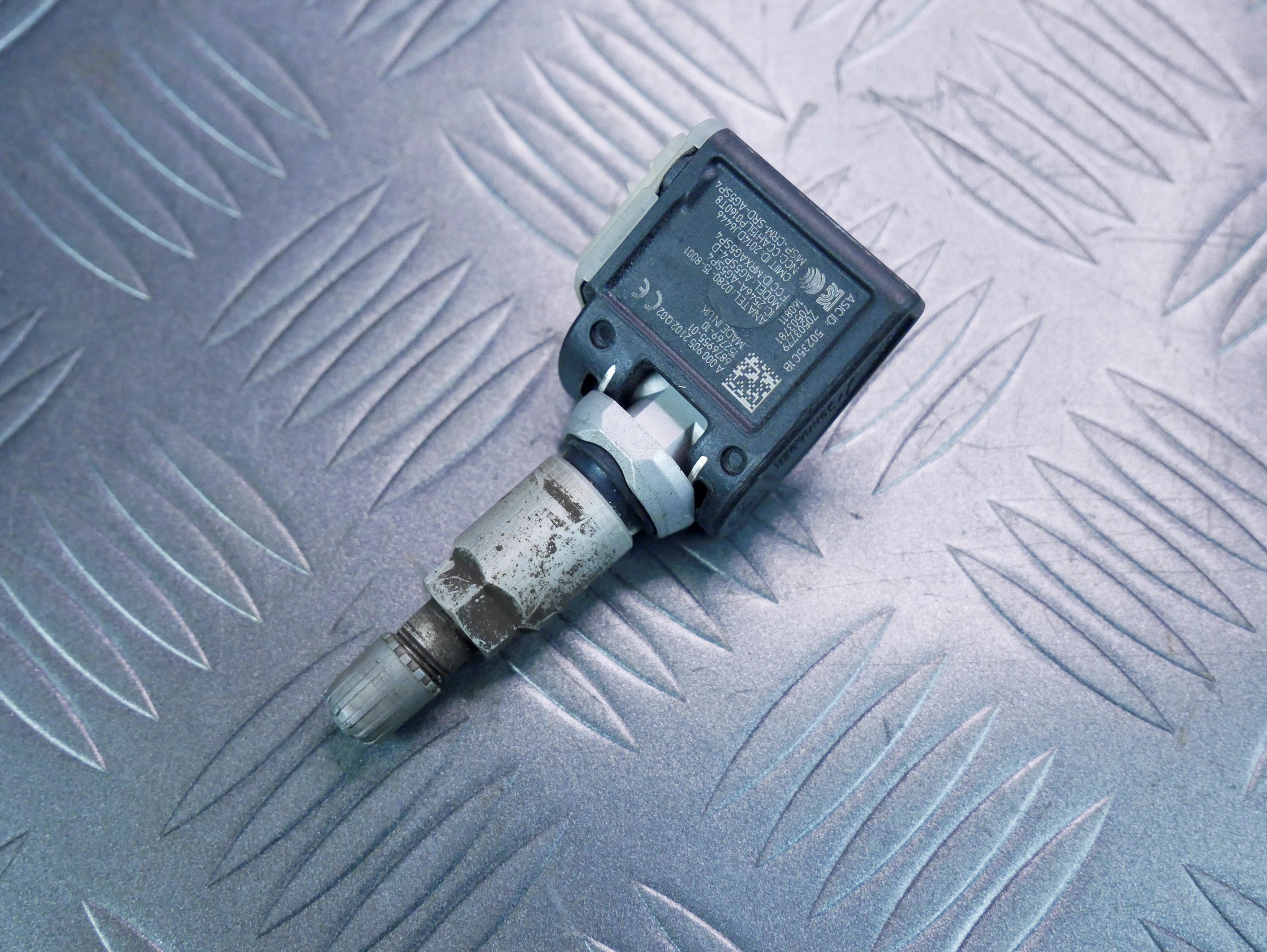 Czujnik TPMS ciśnienia opon kół OEM A0009052102 Mercedes E220D W213