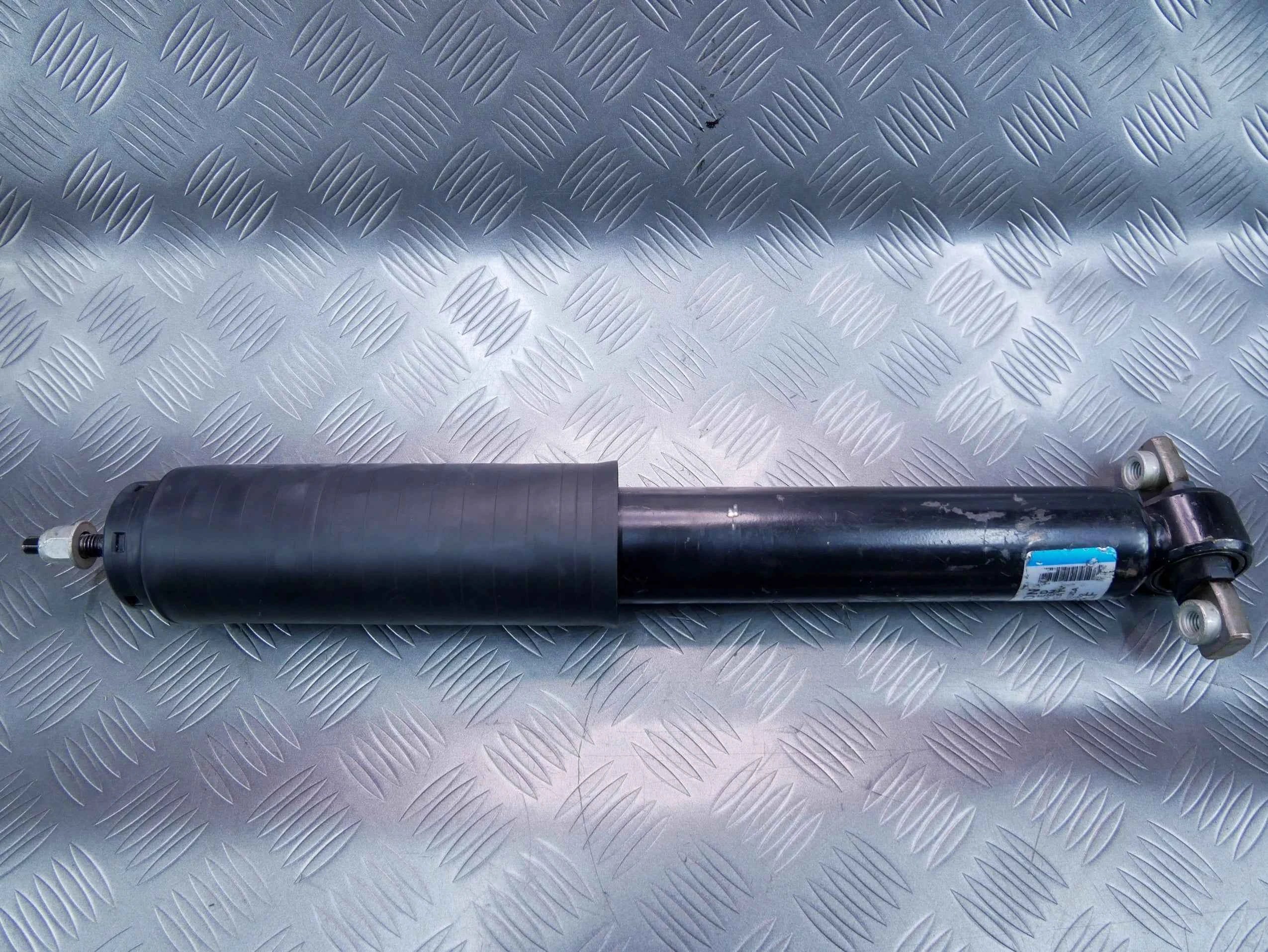 Amortyzator tył lewy NOWY OEM FR3C18W002 Ford Mustang VI