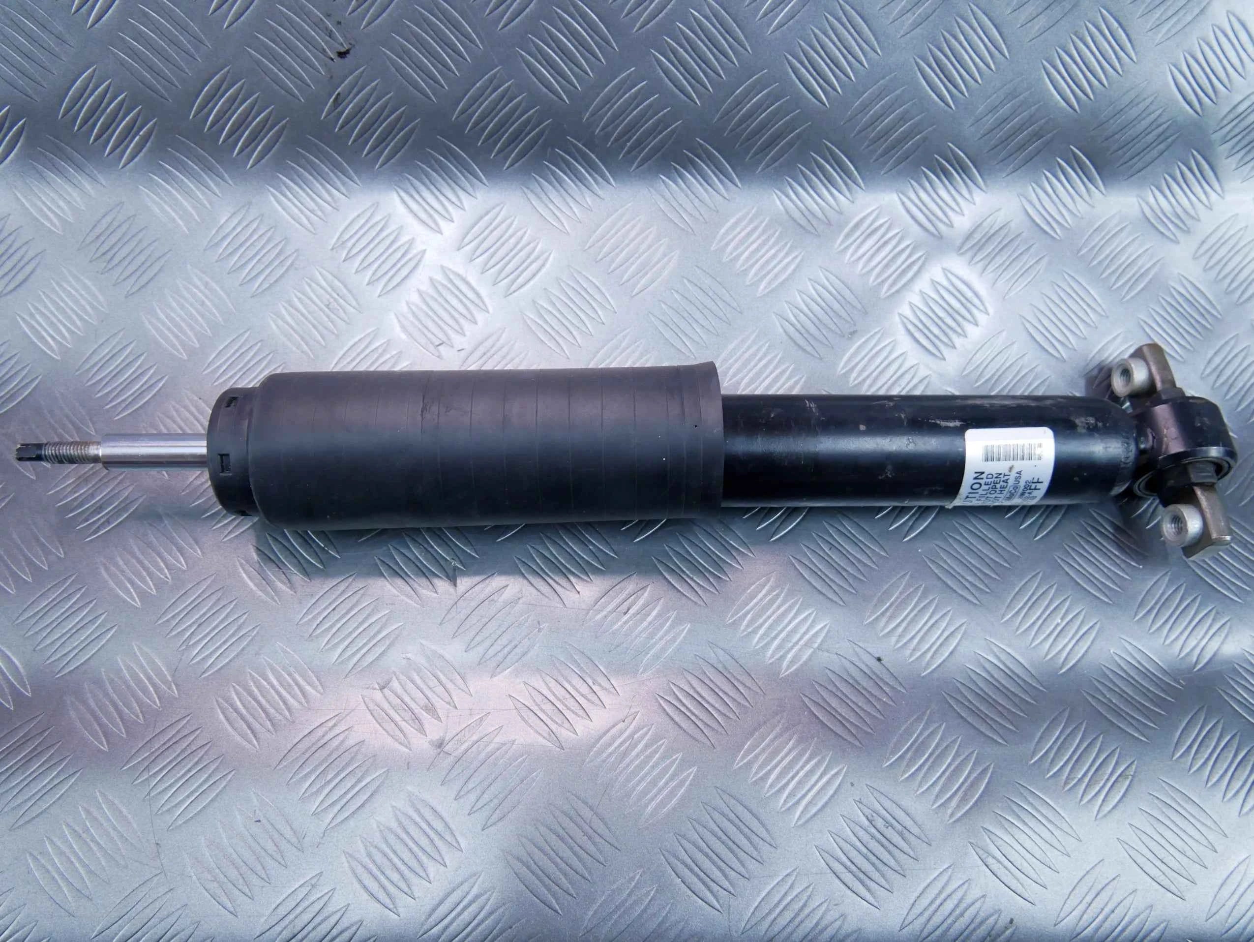 Amortyzator tył lewy NOWY OEM FR3C18W002 Ford Mustang VI