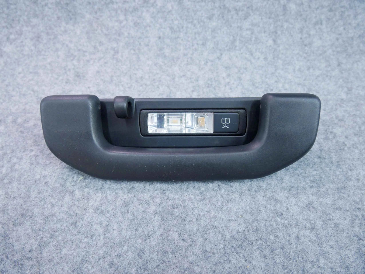 Rączka podsufitki tył tylna prawa czarna A0998150000 Mercedes C300 W05
