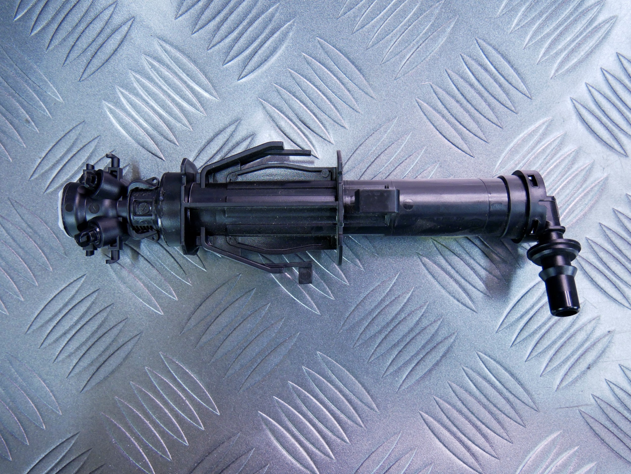 Dysza spryskiwacz lampy lewy 565955965B SKODA KODIAQ