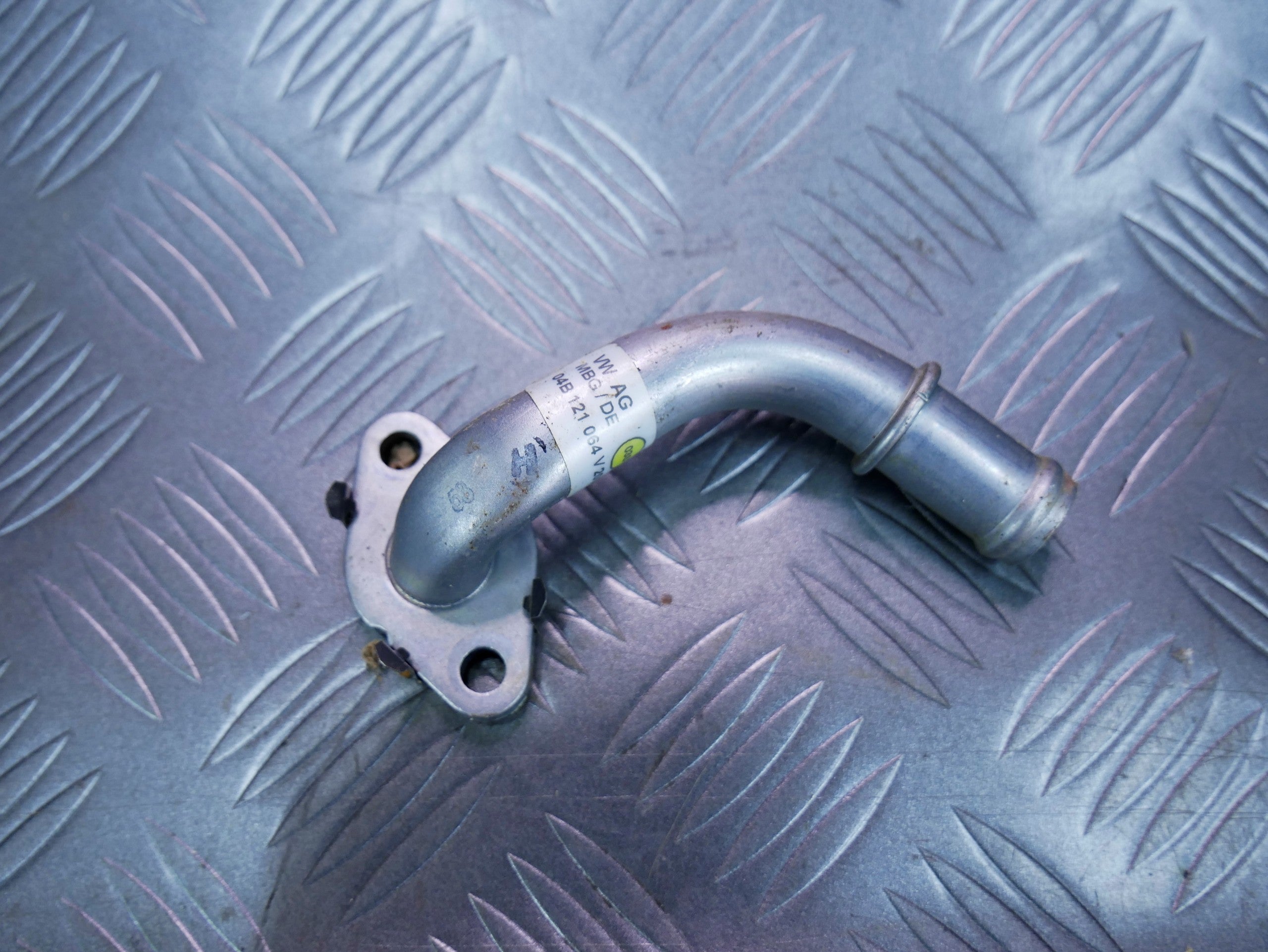 Rurka przewód wody 04B121064 SKODA FABIA III 1.4 TDI