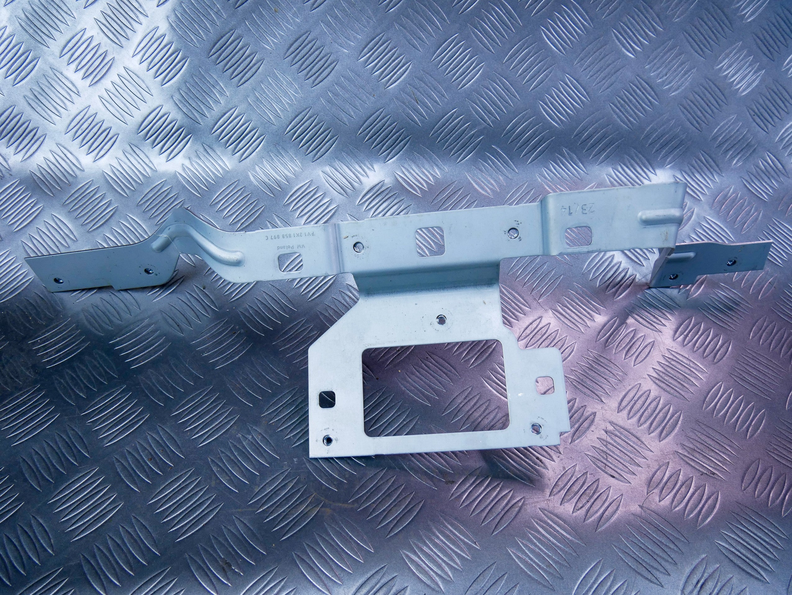 Uchwyt mocowanie konsoli 2K1858897C VW CADDY III IV