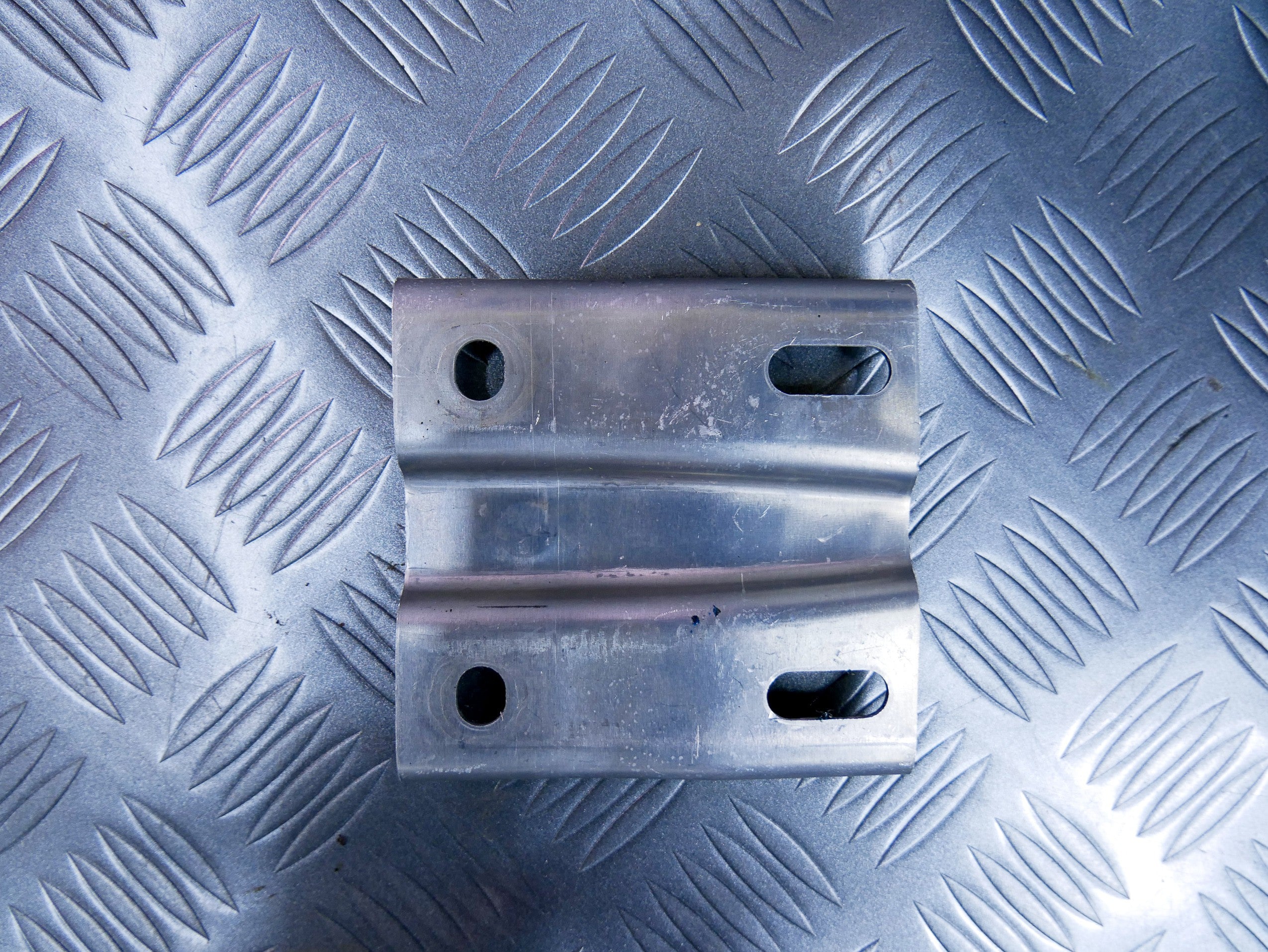 Wspornik mocowanie konsoli 1T0858787 VW CADDY III IV