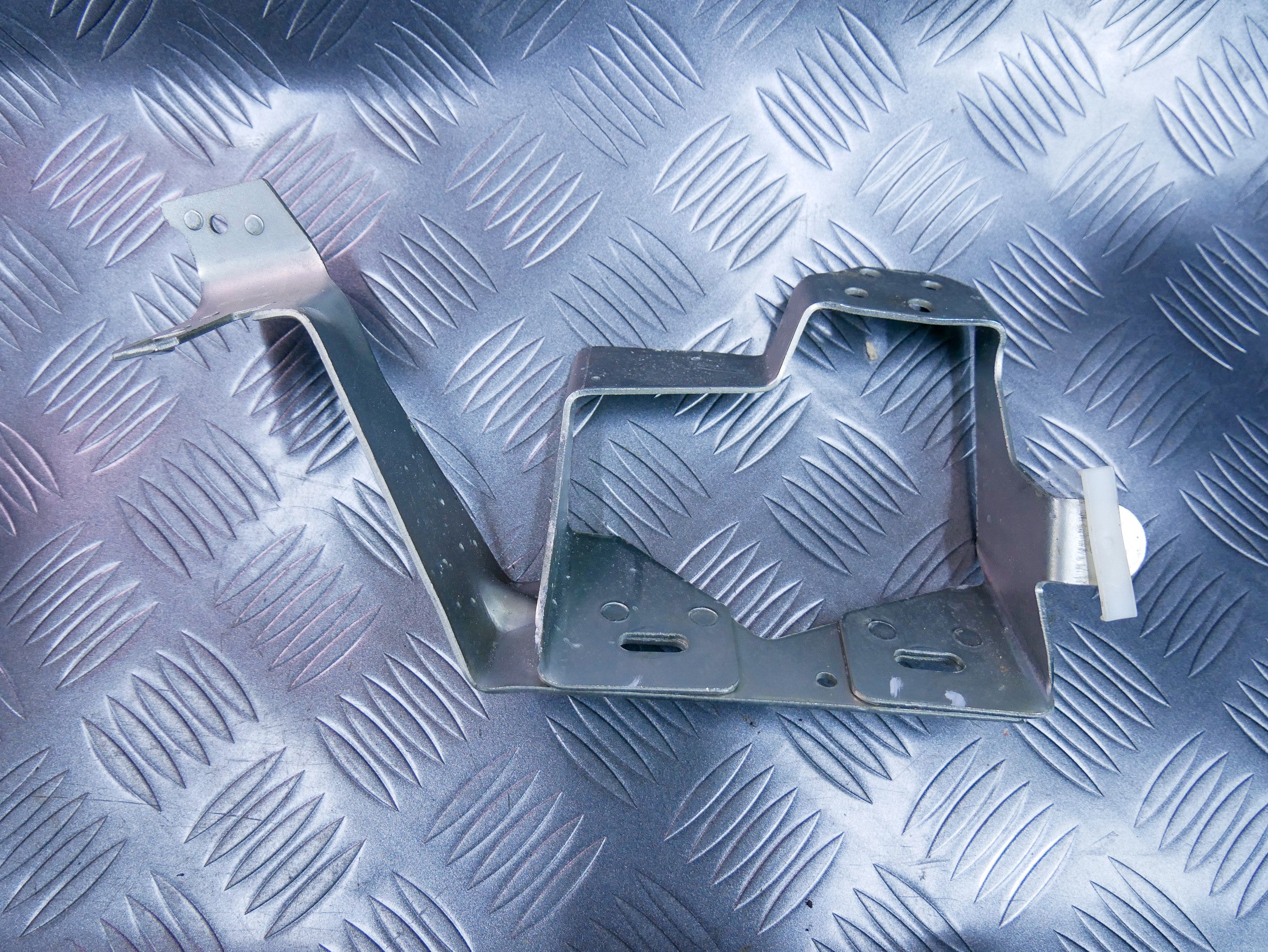 Wspornik mocowanie konsoli 1T1971856F VW CADDY III IV