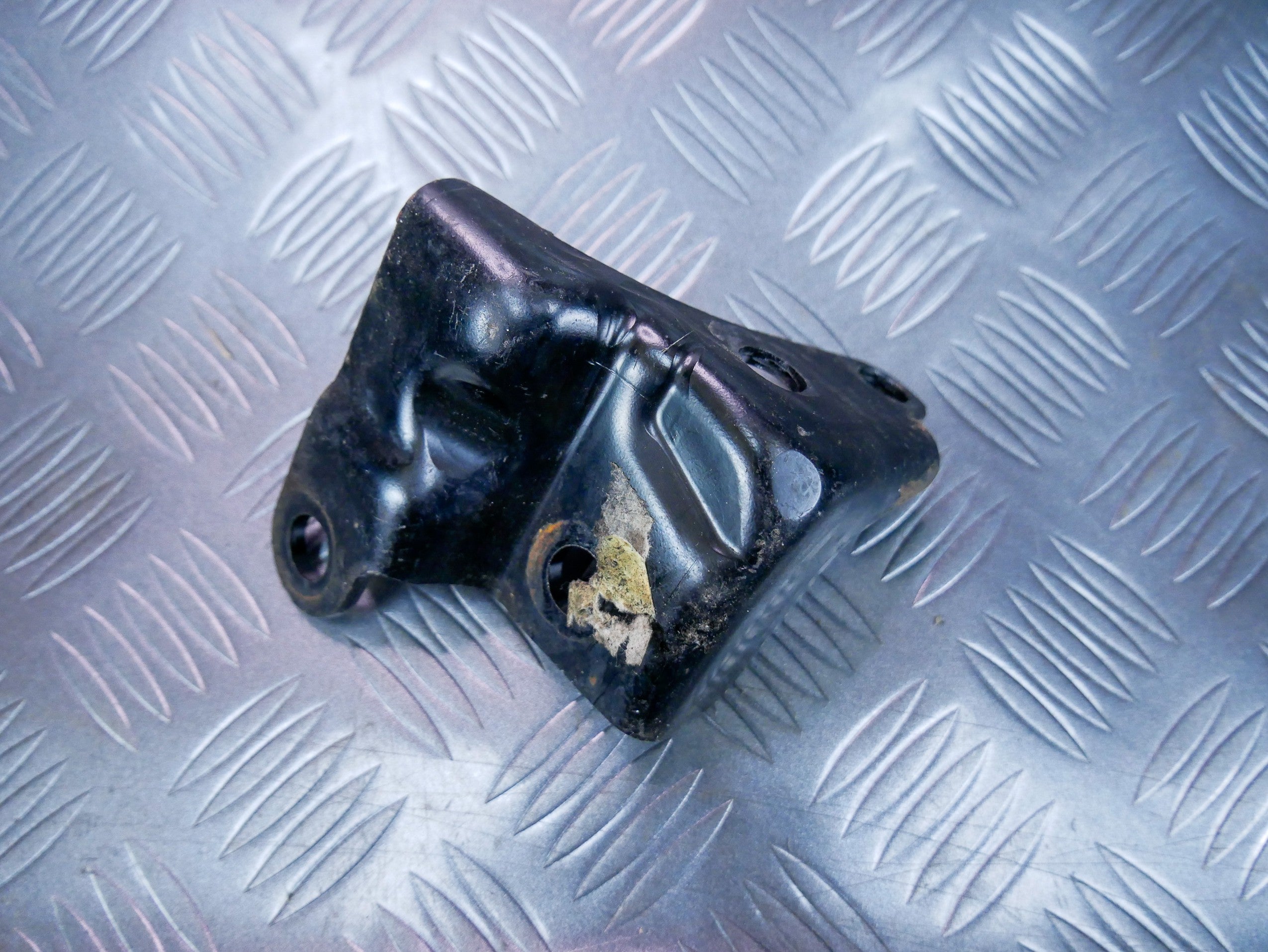 Łapa wspornik mocowanie reduktora 0CN409905A VW CADDY III IV