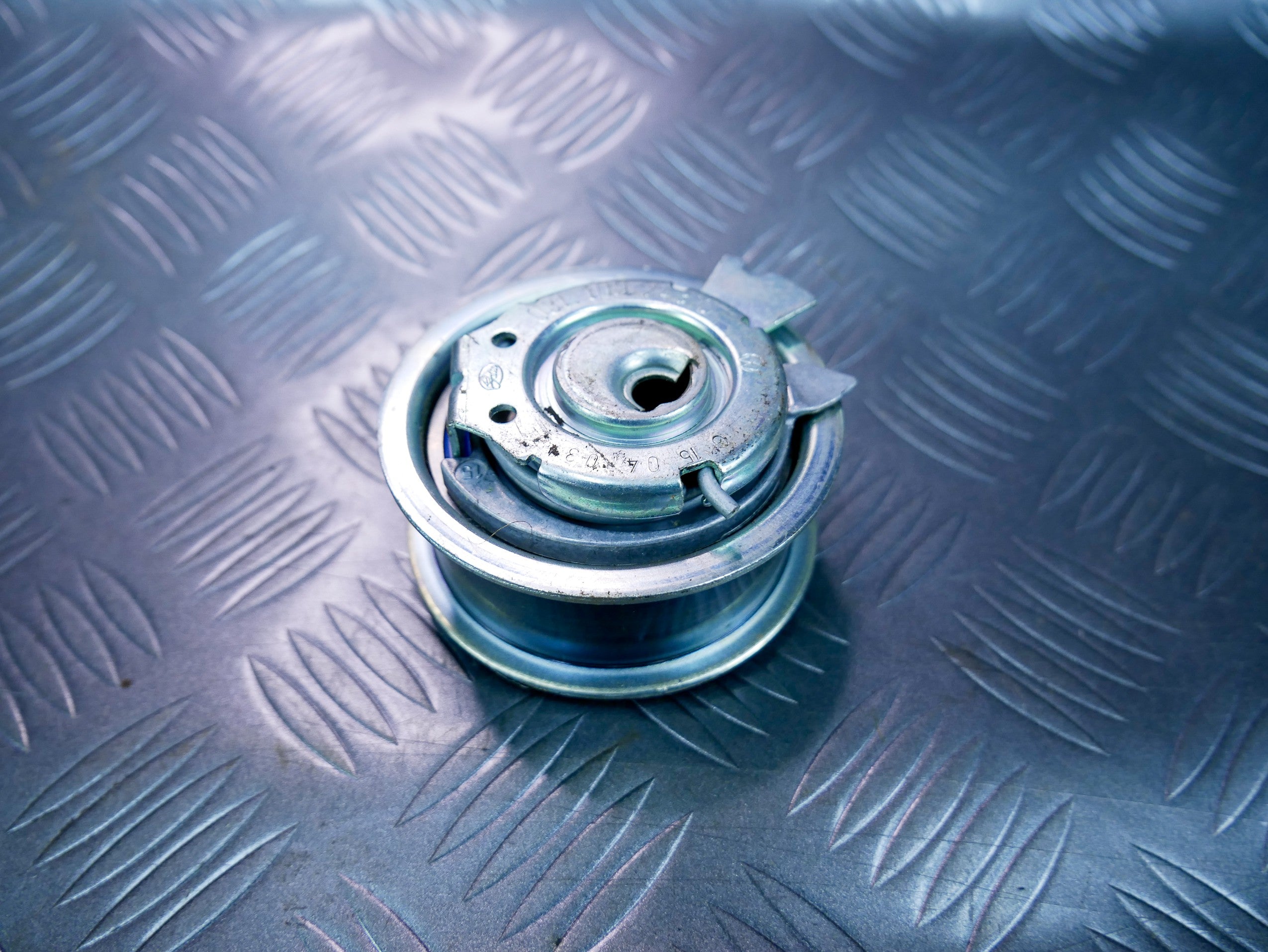 Rolka napinacz paska 03L109243C VW CADDY III 2.0 TDI