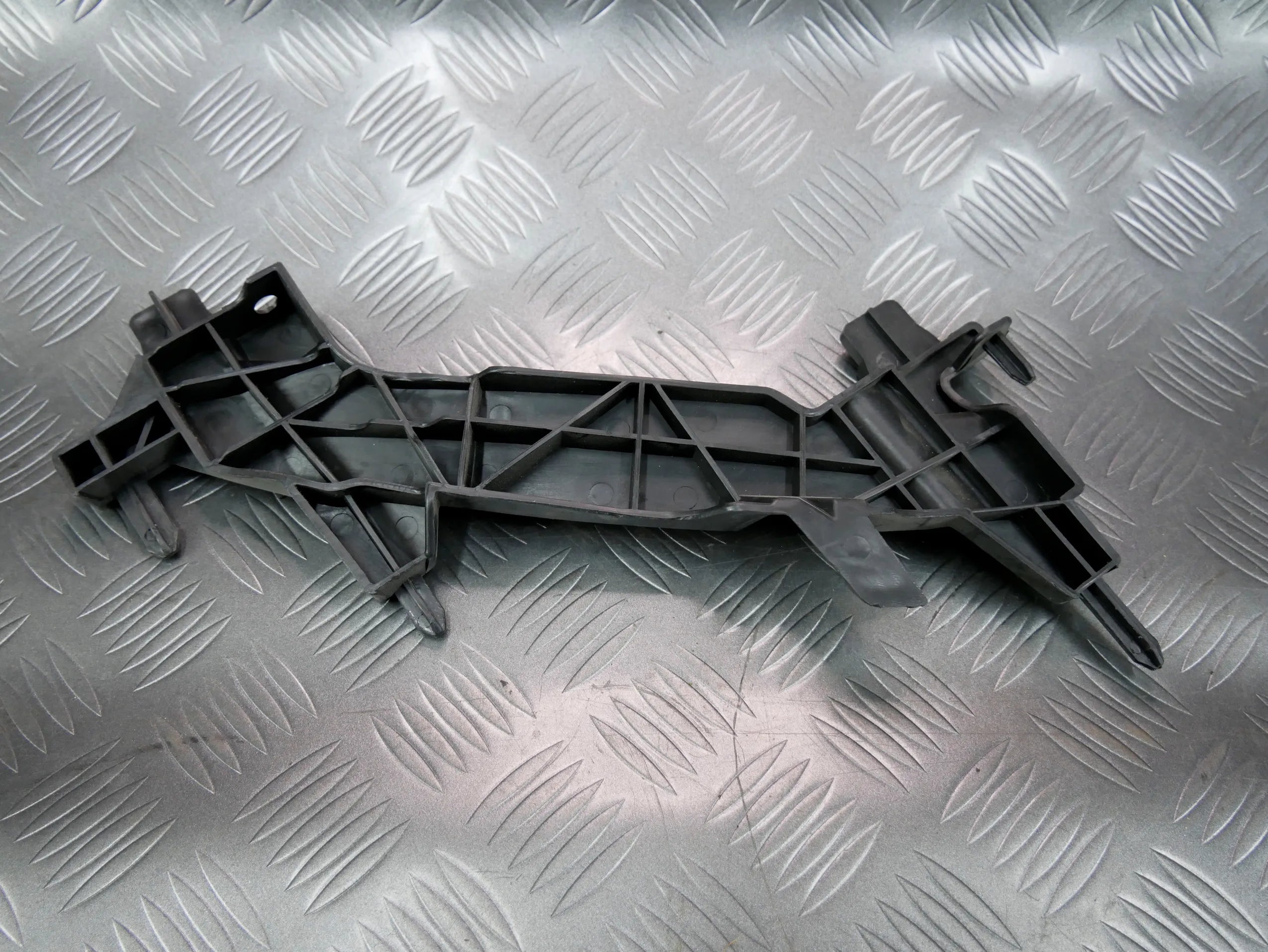 Ślizg zderzaka pod lampę lewy 97050553700 PORSCHE PANAMERA 970 970.2 LIFT