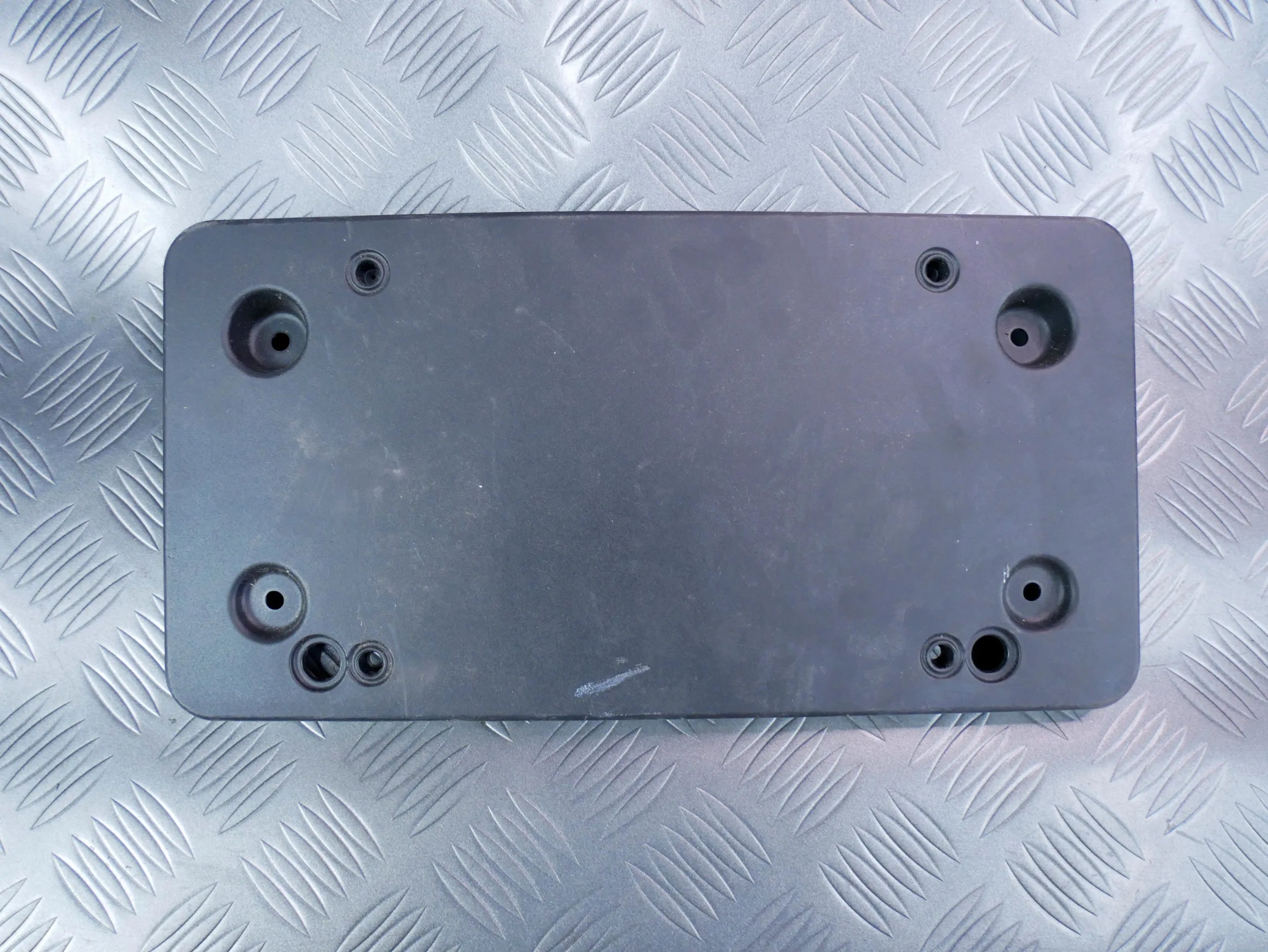 Podkładka tablicy rejestracyjnej 97070110512 PORSCHE PANAMERA 970 LIFT