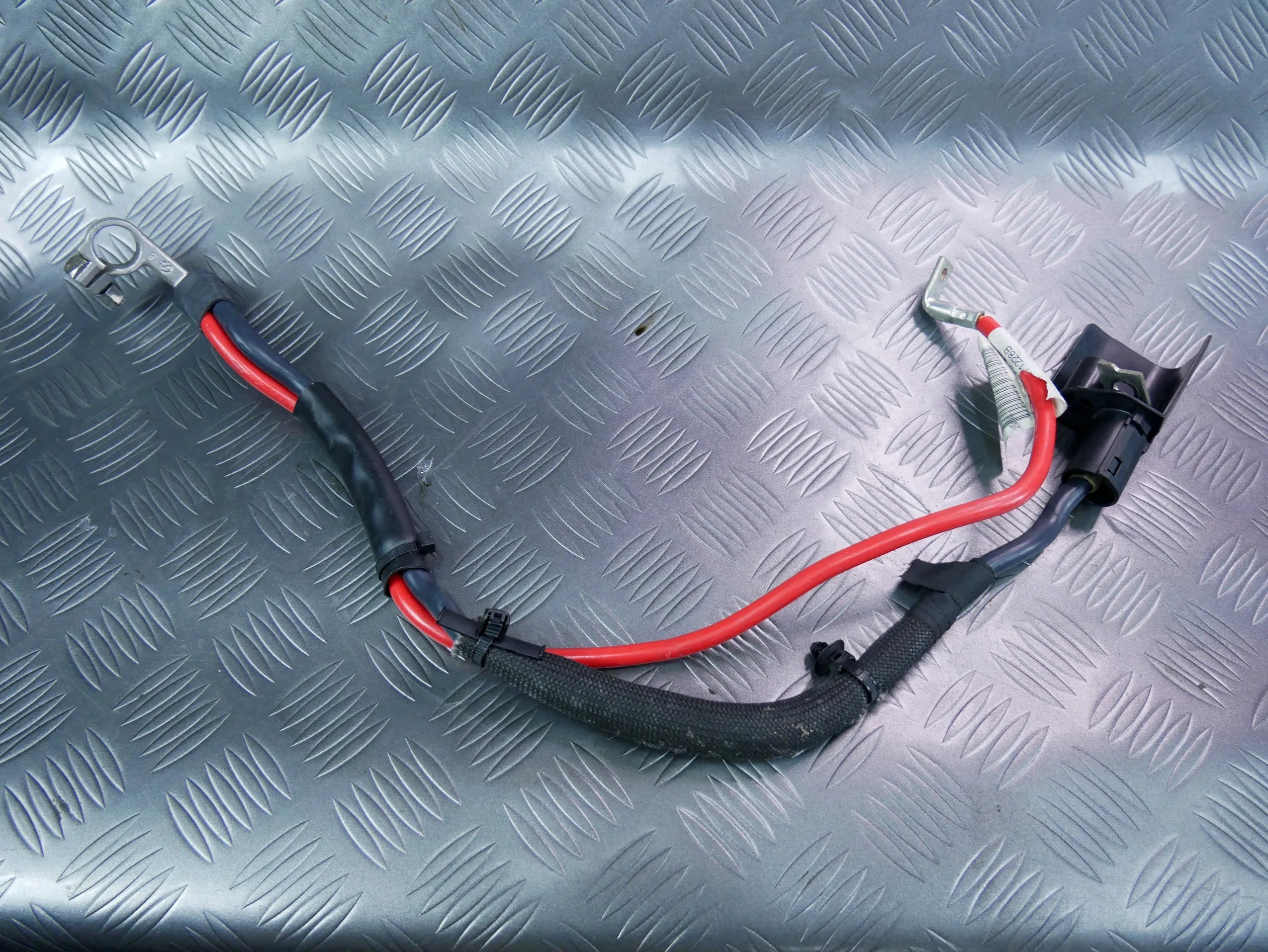 Klema minusowa przewód rozrusznika 5QA971228B VW TOURAN 5T