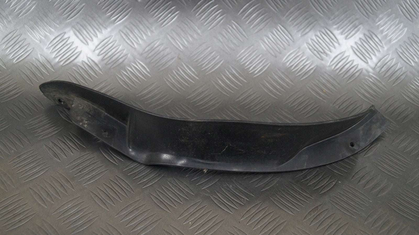 Spoiler nadkola lewy 5L0853887 SKODA YETI